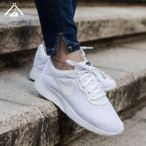 White Nike Tanjun 6.5 sneakers
